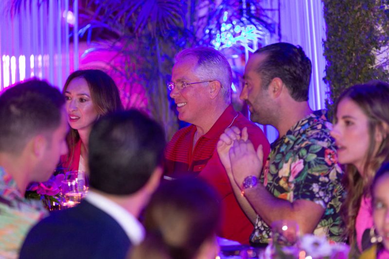 Thomas Henry interacting with guests  during his birthday dinner